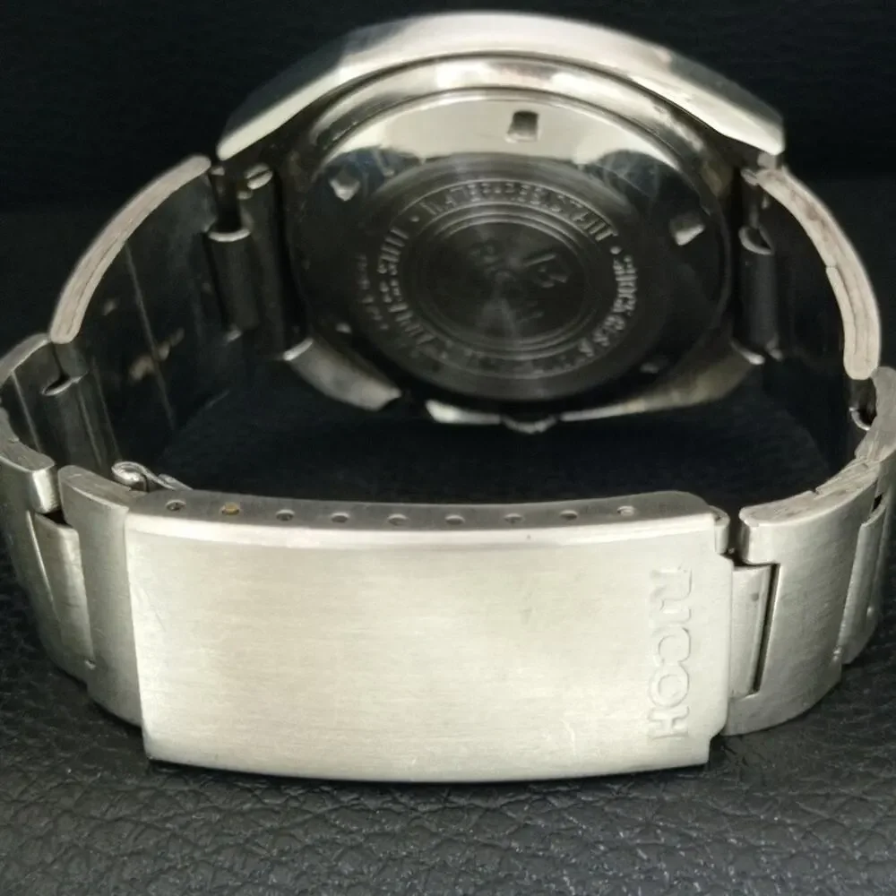 Vintage 1975 Ricoh Automatic Mens Silver Watch W/daydate & Blue accents